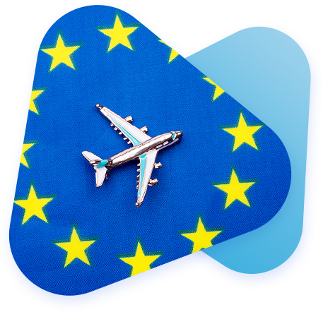 An image of a small metal toy plane resting on the EU flag